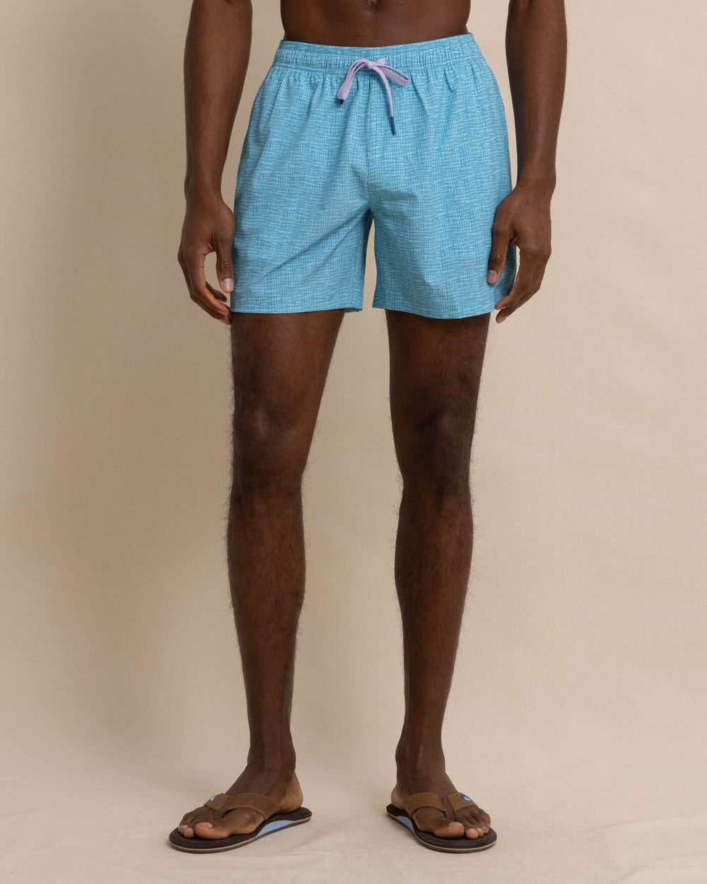The front view of the Southern Tide Painted Check Swim Trunk by Southern Tide - Wake Blue