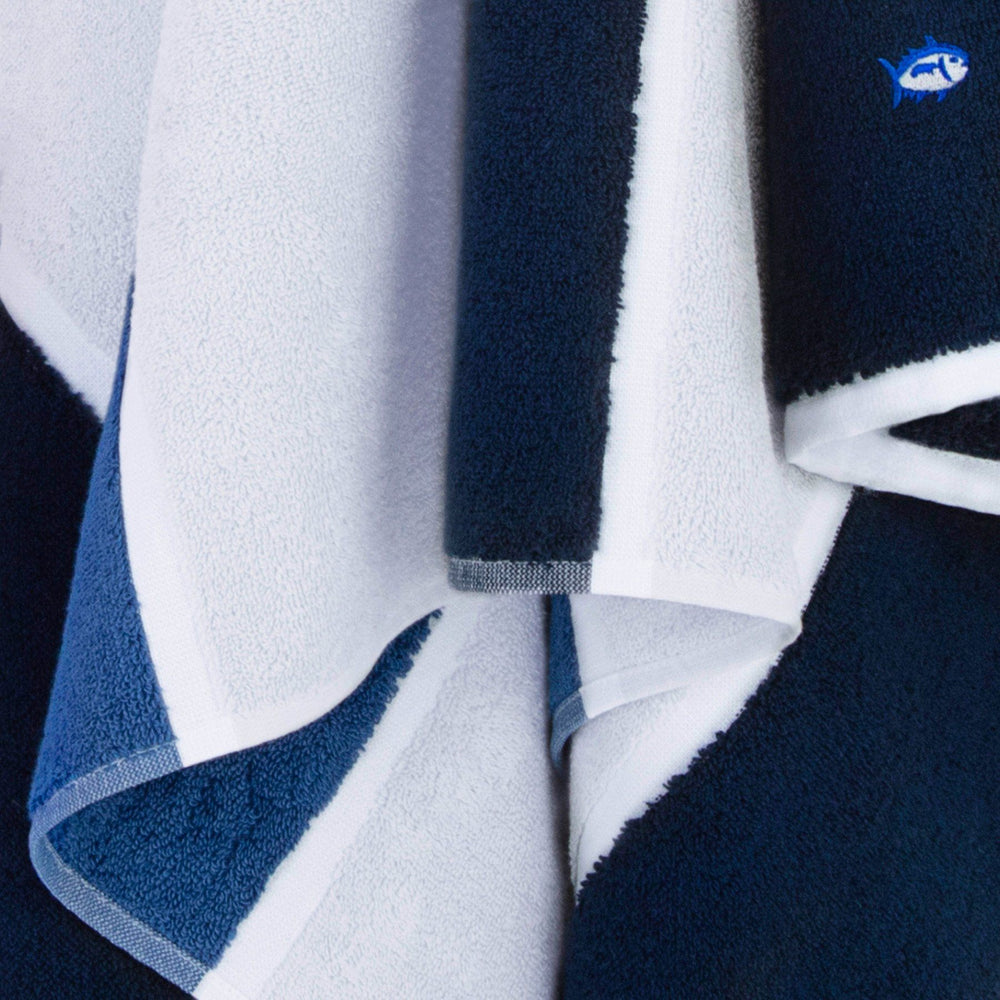 The front view of the Performance Striped Bath Towel in Cobalt Blue by Southern Tide - Cobalt Blue
