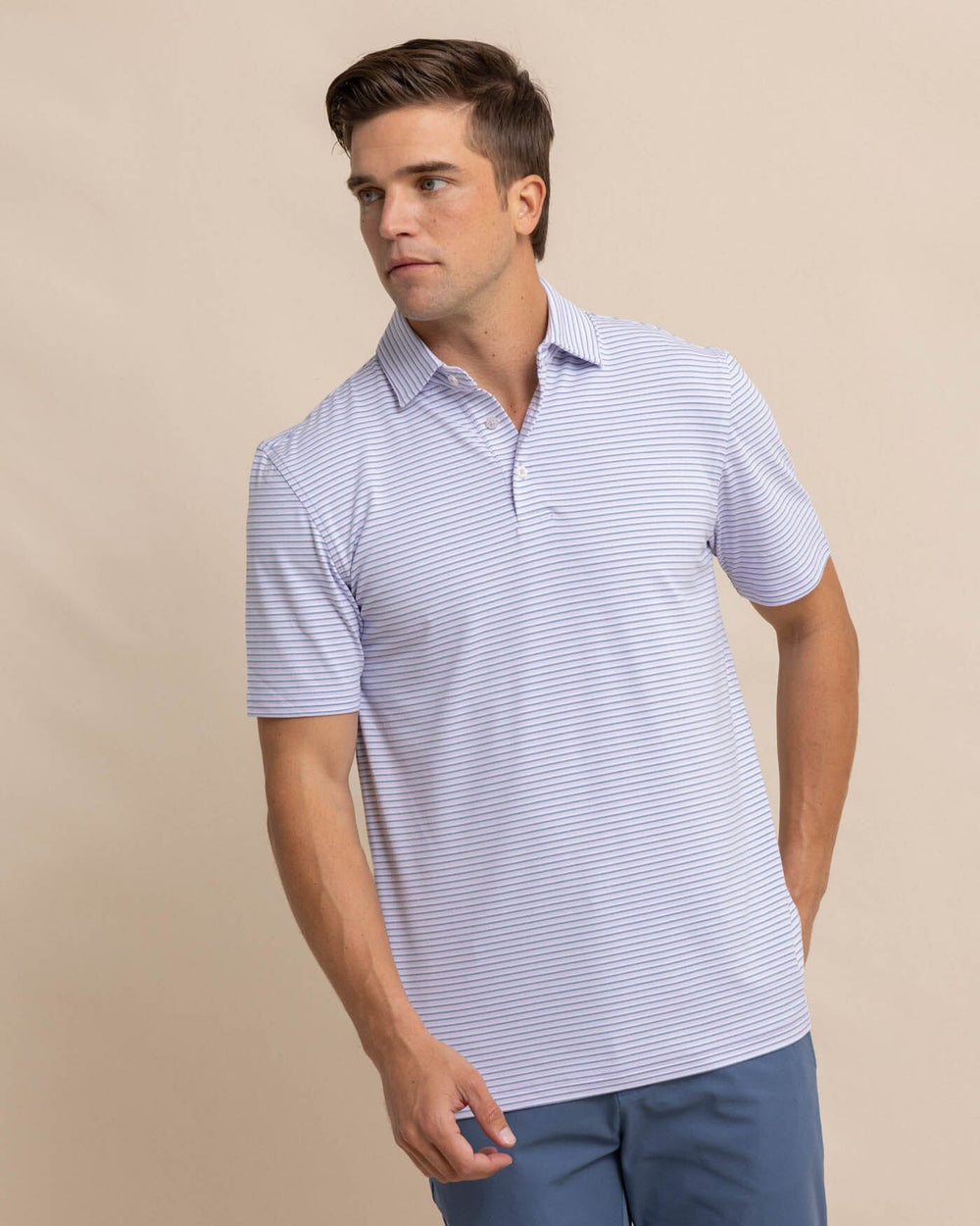 The front view of the Southern Tide Ryder Heather Halls Performance Polo by Southern Tide - Heather Orchid Petal