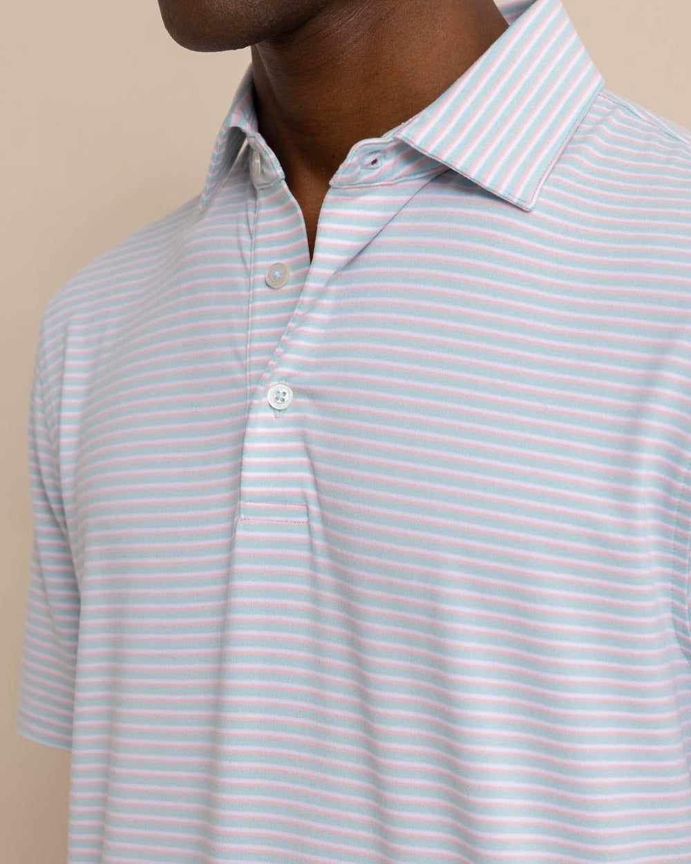 The detail view of the Southern Tide Ryder Heather Halls Performance Polo by Southern Tide - Heather Wake Blue