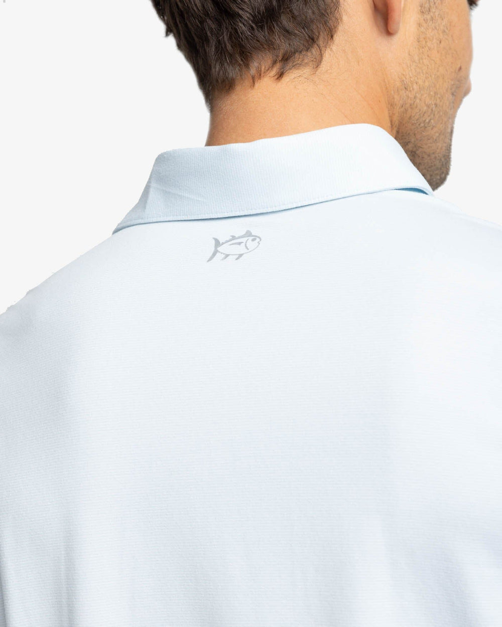 The yoke view of the Southern Tide Ryder Heather Ridgeway Stripe Long Sleeve Performance Polo by Southern Tide - Heather Cloud White