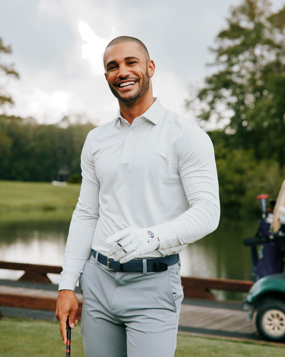 The front view of the Southern Tide Ryder Heather Ridgeway Stripe Long Sleeve Performance Polo by Southern Tide - Heather Platinum Grey