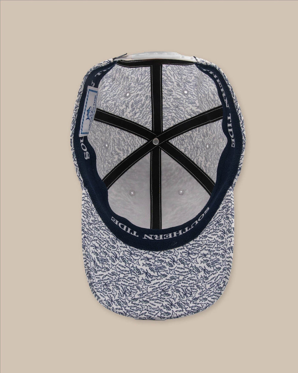 The detail view of the Southern Tide Schooling Fish Performance Hat by Southern Tide - Classic White