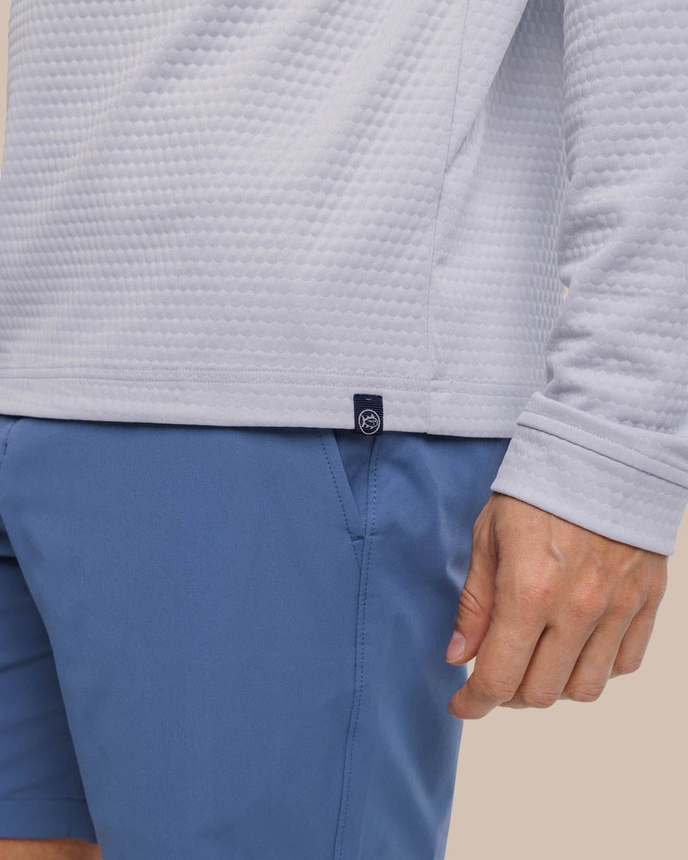 The label detail view of the Southern Tide Scuttle Heather Quarter Zip Pullover by Southern Tide - Heather Slate Grey