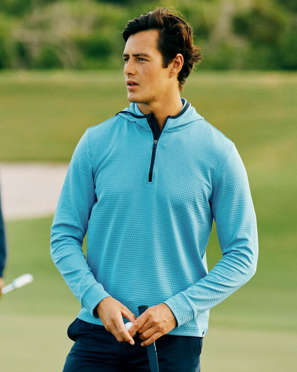 The front view of the Southern Tide Scuttle Heather Performance Quarter Zip Hoodie by Southern Tide - Heather Ocean Teal