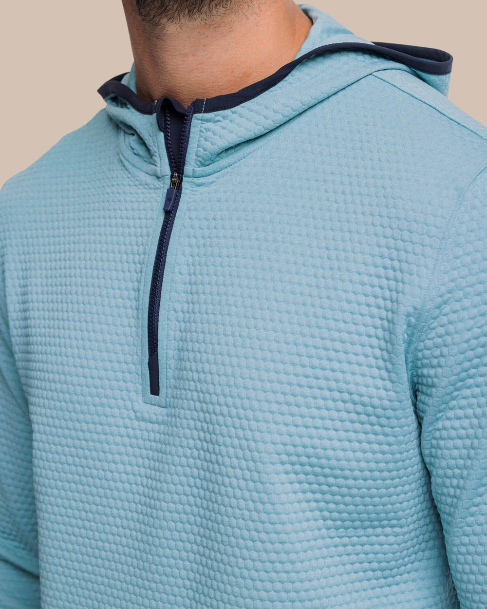 The detail view of the Southern Tide Scuttle Heather Performance Quarter Zip Hoodie by Southern Tide - Heather Ocean Teal