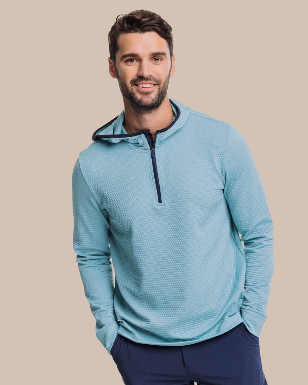 The front view of the Southern Tide Scuttle Heather Performance Quarter Zip Hoodie by Southern Tide - Heather Ocean Teal