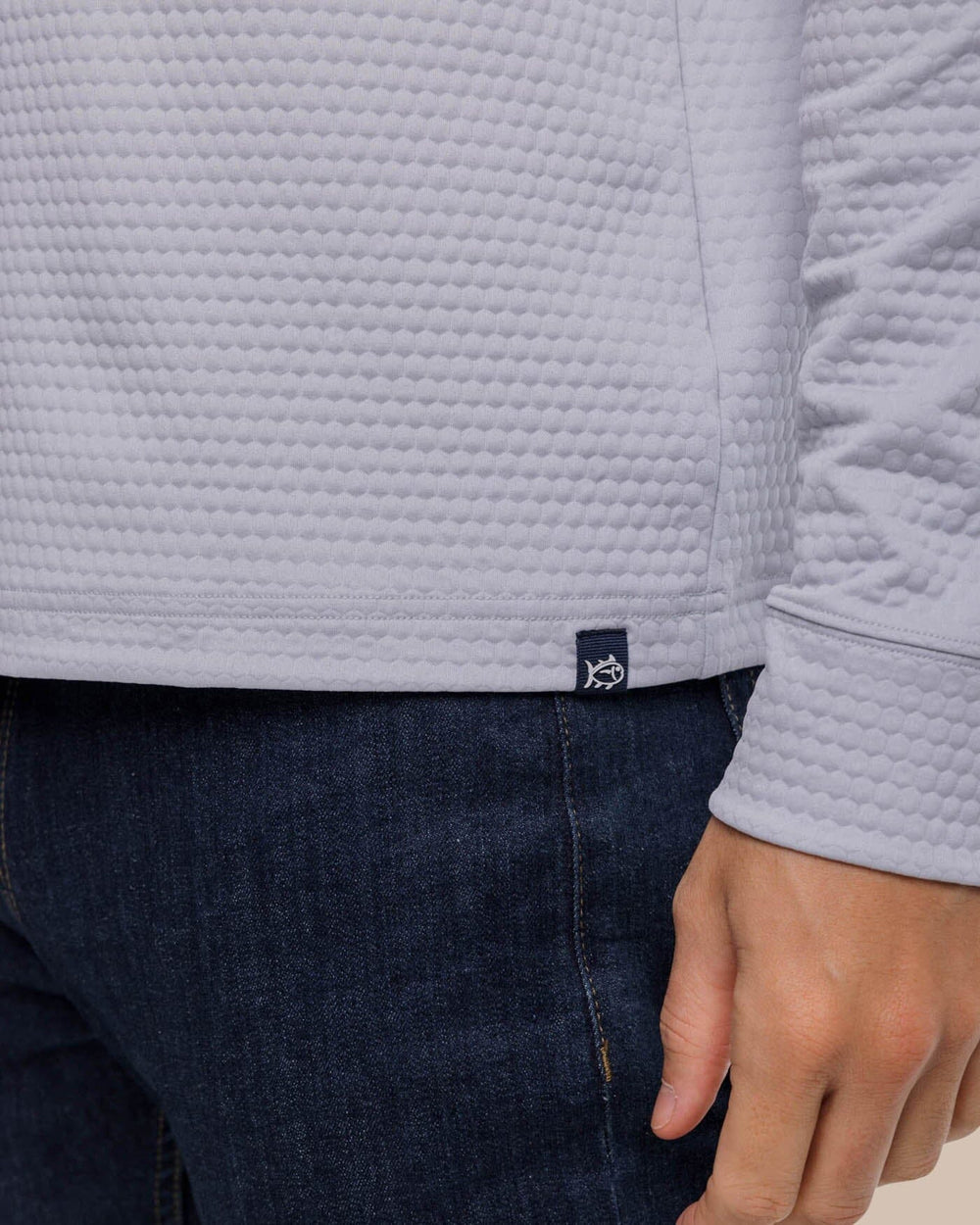 The label view of the Southern Tide Scuttle Heather Performance Quarter Zip Hoodie by Southern Tide - Heather Slate Grey