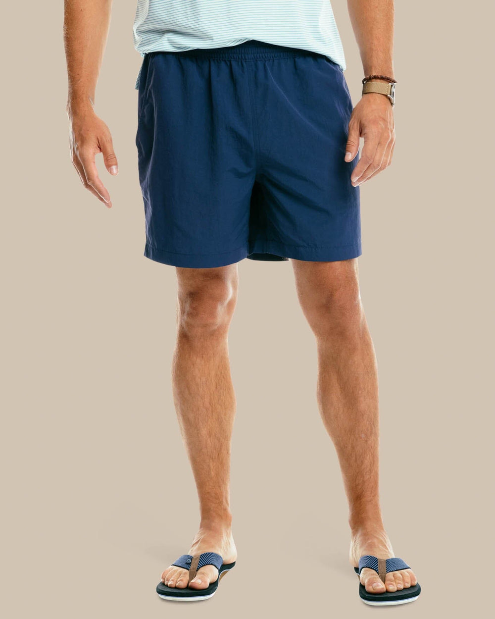 The model front view of the Men's Shoreline 6 Inch Short by Southern Tide  - True Navy
