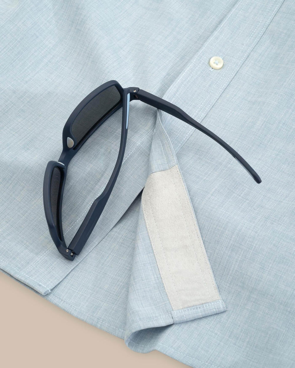 The hem of the Men's Grey Short Sleeve Dock Shirt by Southern Tide - Seagull Grey