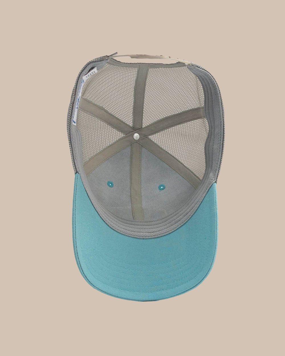 The detail view of the Southern Tide Kids Skipjack Trademark Trucker Hat by Southern Tide - Blue