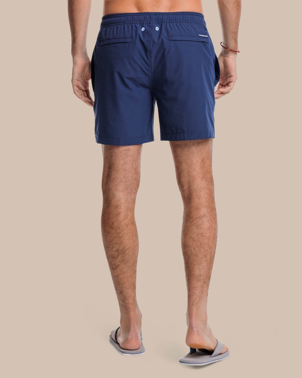 The back view of the Southern Tide Solid Swim Trunk 3 by Southern Tide - True Navy