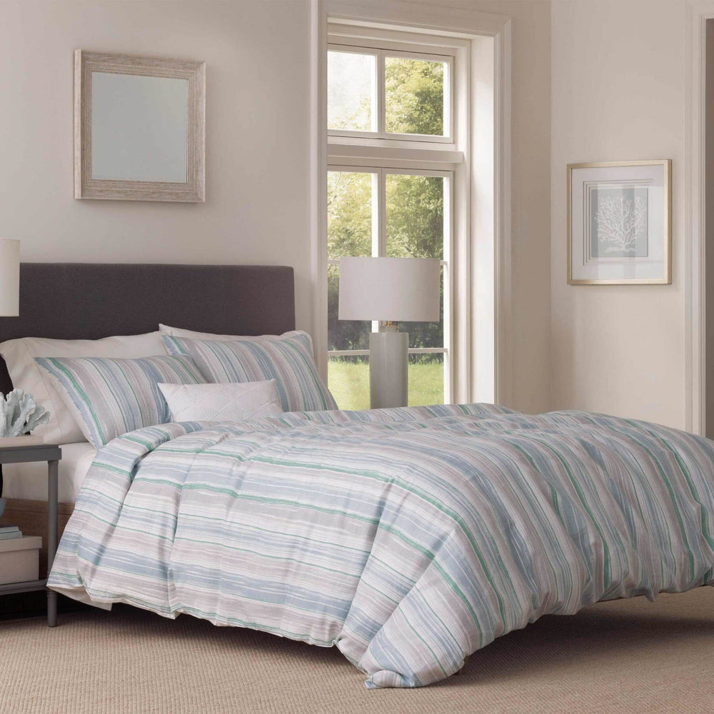 The angle front view of the Southern Tide Southern Tide Emerald Isle Blue Comforter Set by Southern Tide - Blue
