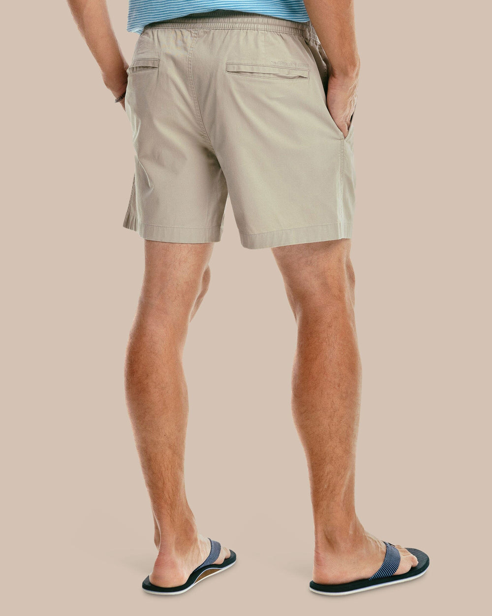 The model back view of the Sun Farer 6 inch short - Sand Dollar