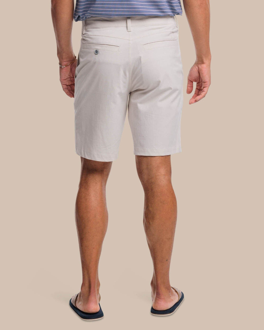 The back view of the Southern Tide T3 Gulf 9 Inch Performance Short by Southern Tide - Stone