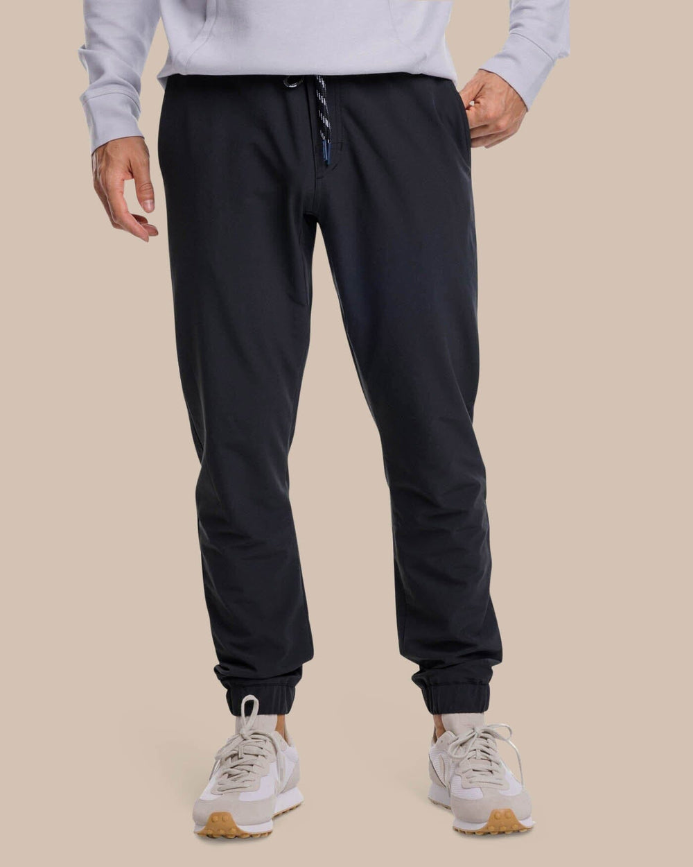 The front view of the Southern Tide The Excursion Performance Jogger by Southern Tide - Caviar Black
