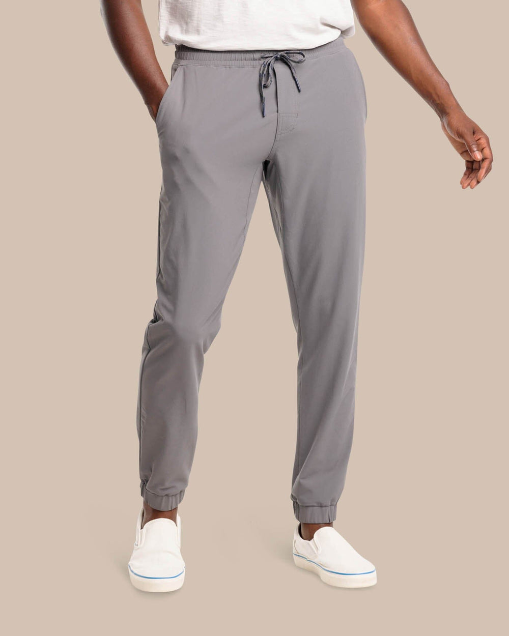 The front view of the The Excursion Performance Jogger by Southern Tide - Smoked Pearl