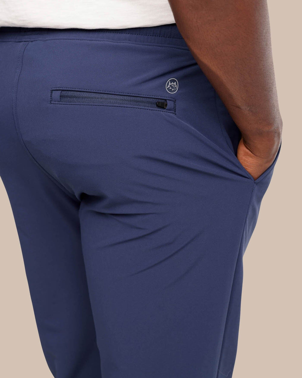 The detail view of the The Excursion Performance Jogger by Southern Tide - True Navy