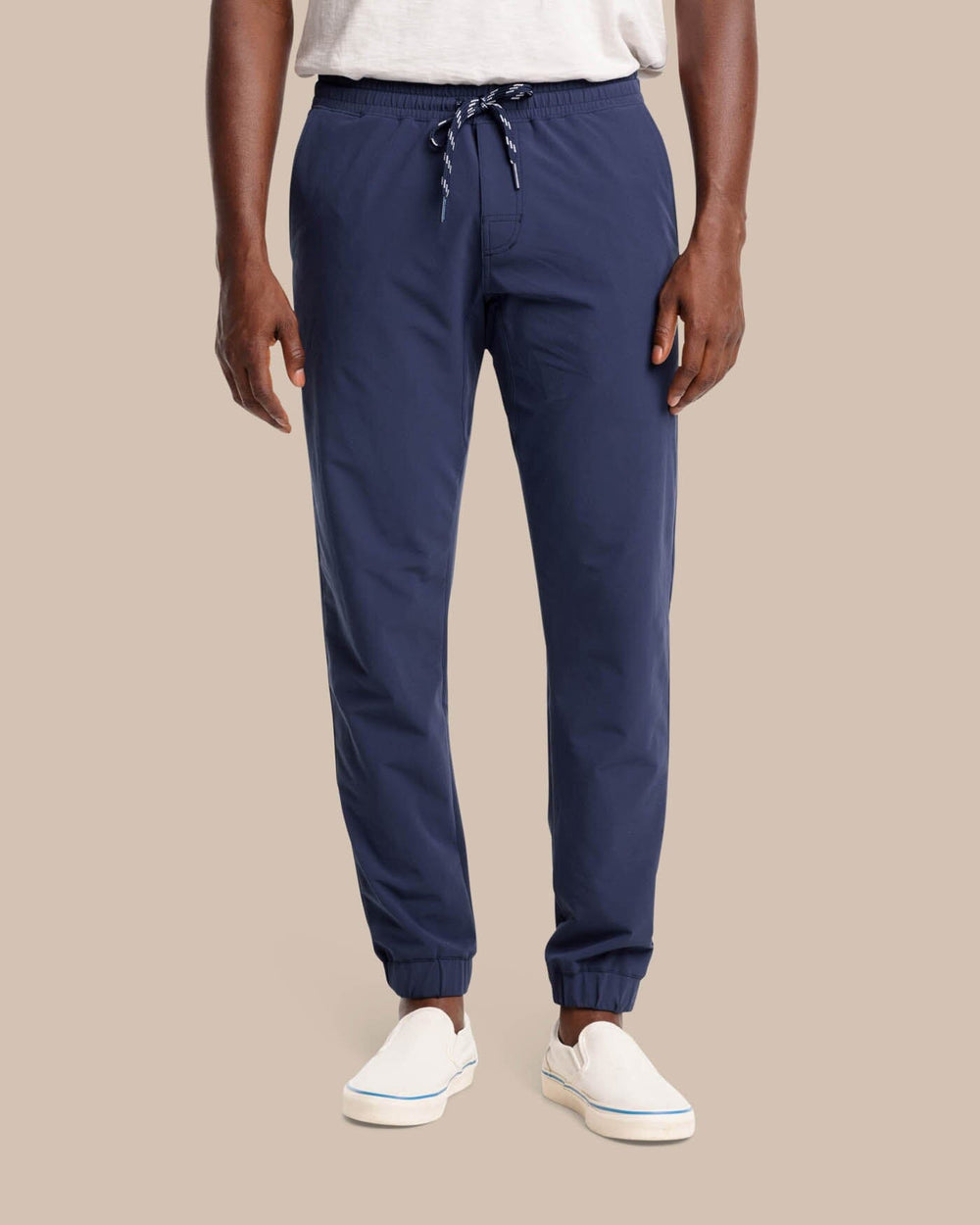The front view of the The Excursion Performance Jogger by Southern Tide - True Navy