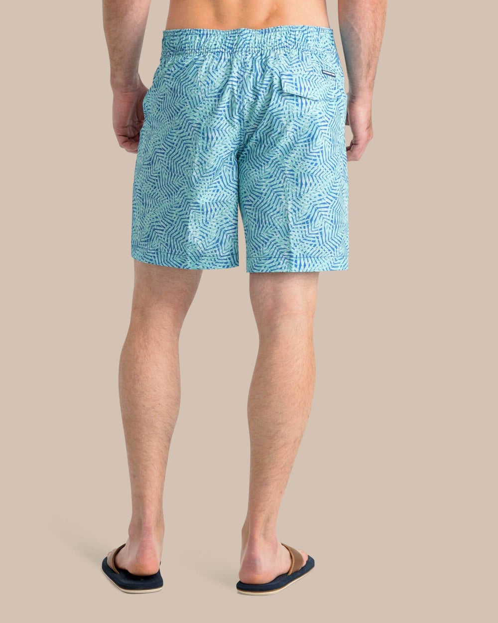 The back view of the Southern Tide Vibin' Palm Printed Swim Short by Southern Tide - Atlantic Blue