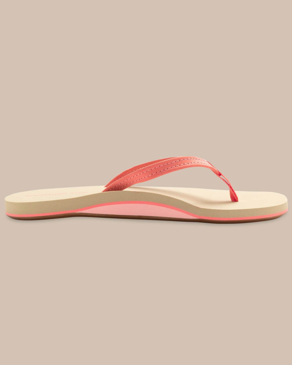 The side view of the Women's Weekend Conch Shell Leather by Southern Tide - Conch Shell