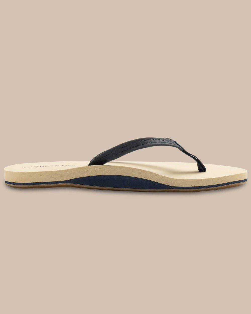 The side view of the Women's Weekend Navy Leather by Southern Tide - Nautical Navy