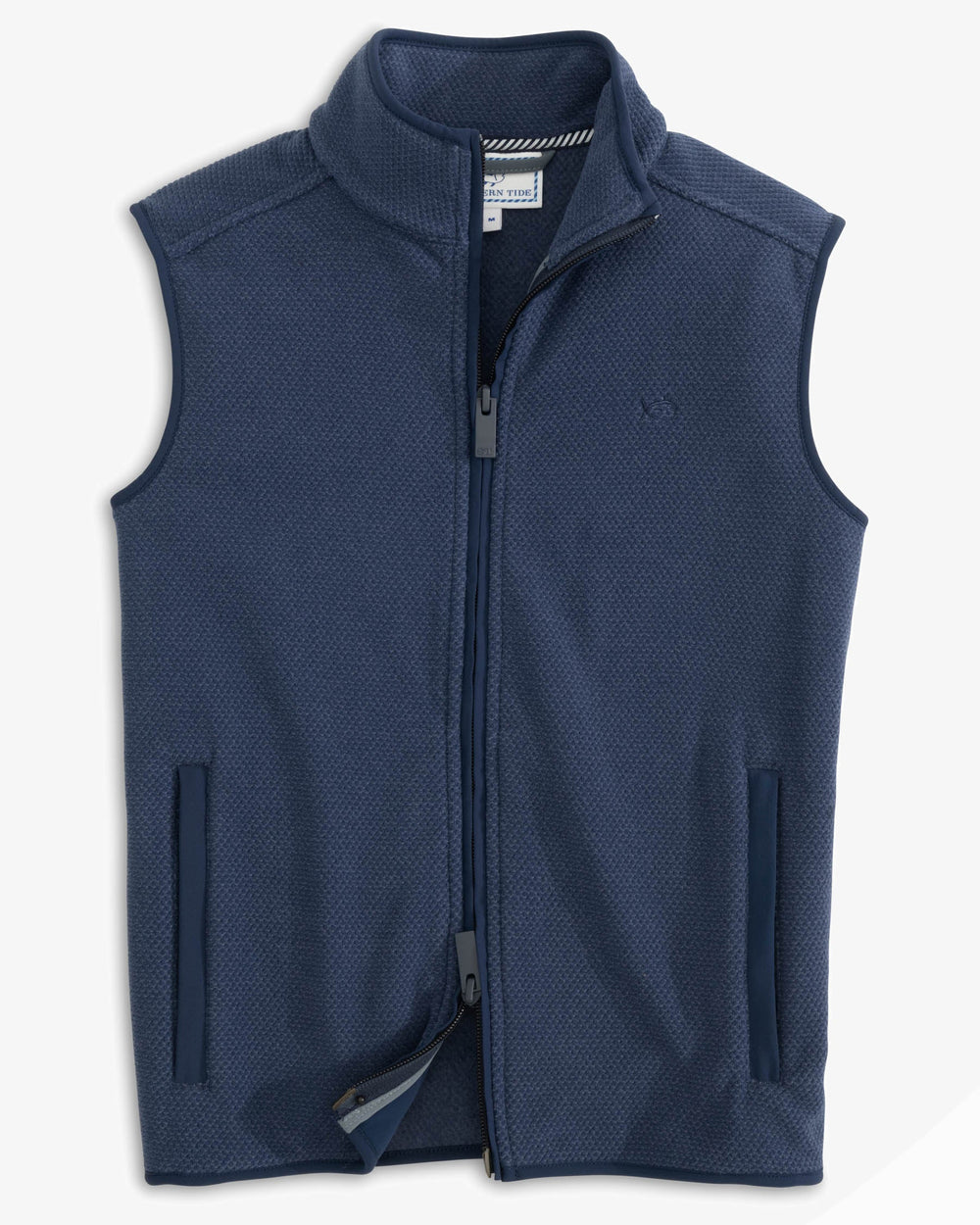 The front view of the Youth Hucksley Vest by Southern Tide - True Navy