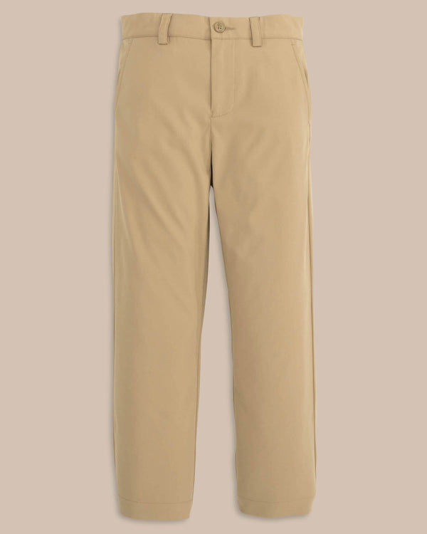 The front view of the Youth Leadhead Performance Pant by Southern Tide - Sandstone Khaki